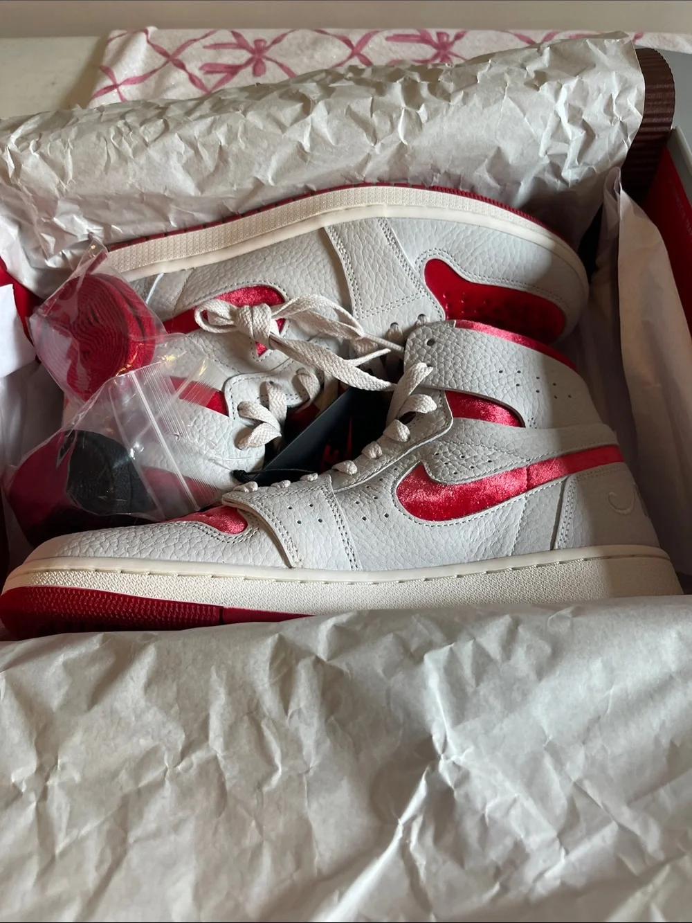 Jordan Women’s High-Top Sneakers in White and Red